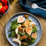 flat-lay-mix-nuts-figs-plate-with-strawberries