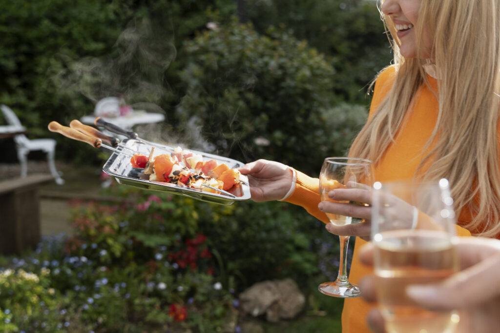 side-view-smiley-woman-holding-tray-with-food